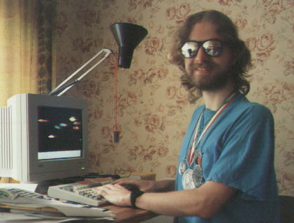 Programmer with sunglasses and medals
